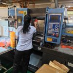 Injection molding worker
